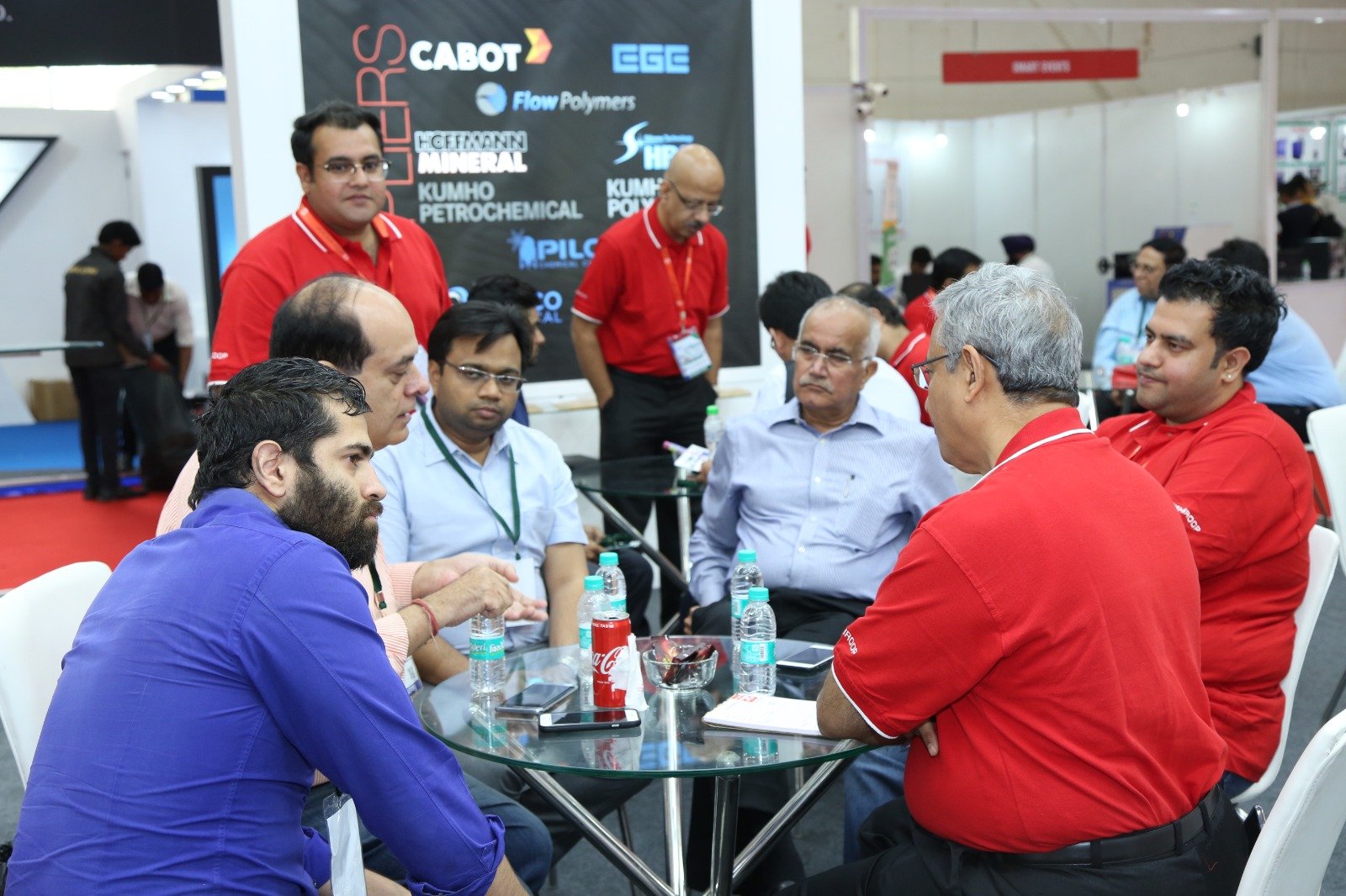 Asia Rubber Expo — busy aisle.